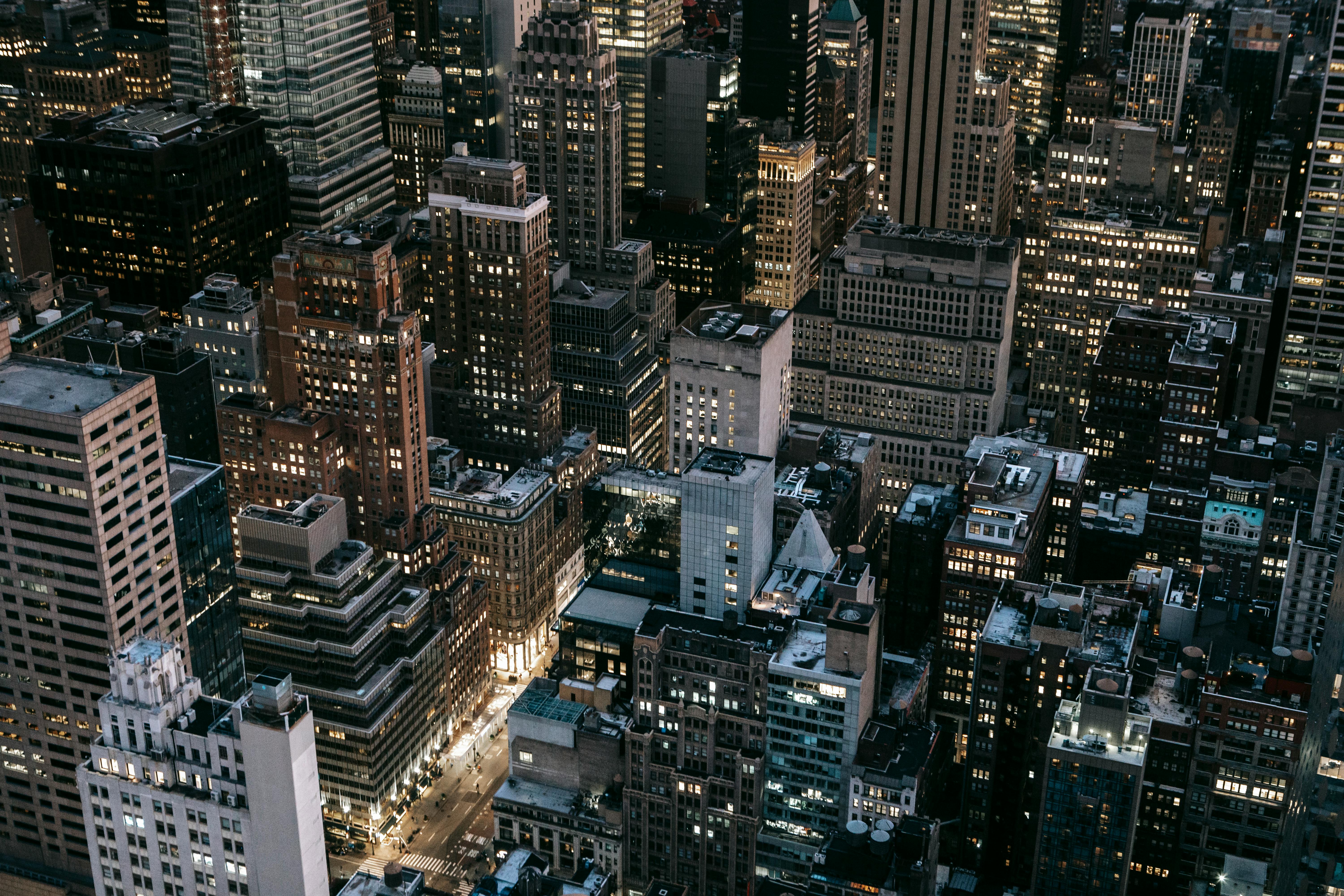 Aerial view of a city skyline at dusk